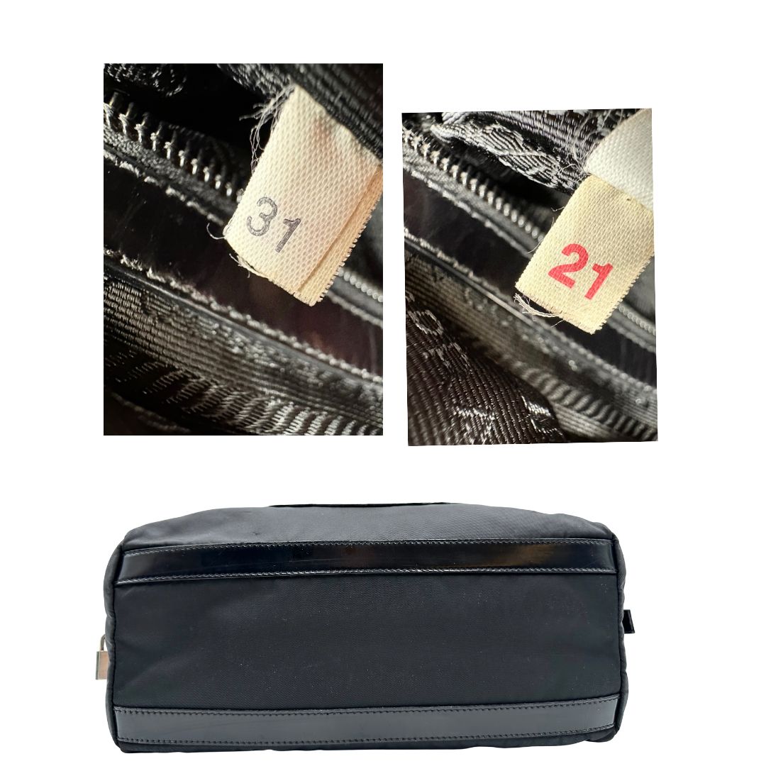 base Borsa Prada in nylon nero con finiture in pelle tono su tono e parti metalliche argentate; munita di doppi manici e accessorio porta address, di lusso, originale, ottime condizioni, usata. 