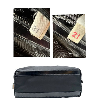base Borsa Prada in nylon nero con finiture in pelle tono su tono e parti metalliche argentate; munita di doppi manici e accessorio porta address, di lusso, originale, ottime condizioni, usata. 
