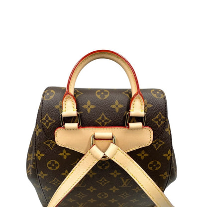 Manico di uno zaino LV in canvas marrone monogram con finiture in vacchetta naturale e parti metalliche dorate; munito di due bretelle regolabili. Full set.