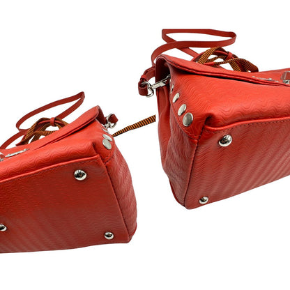 angoli Borsa Zanellato in pelle arancione trama Blandine; munita di un manico singolo e una tracolla amovibile e regolabile. Completa di dustbag e cartellini, di lusso, originale, ottime condizioni. 