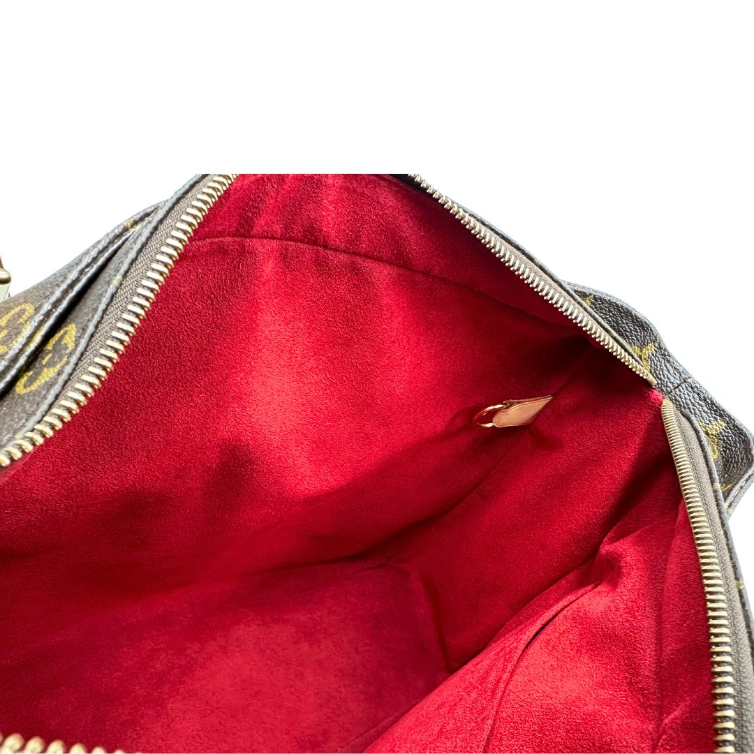 interno  Borsa Multipli Citè LV in canvas monogram, di lusso, originale, ottime condizioni, usata. 