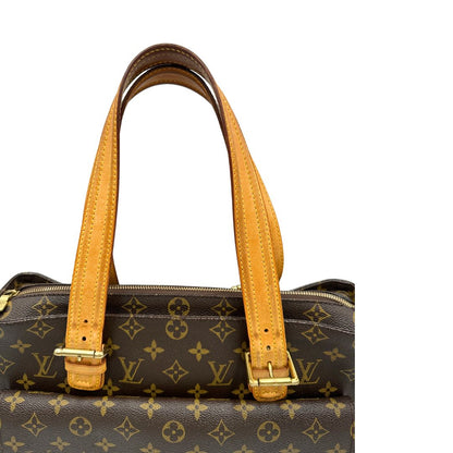 manici  Borsa Multipli Citè LV in canvas monogram, di lusso, originale, ottime condizioni, usata. 