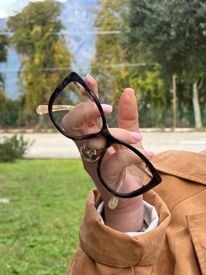 Montatura occhiali Dolce & Gabbana in acetato marrone effetto tartarugato con asticelle beige perlato e dettagli metallici dorati. Originali, usati, di lusso, in ottime condizioni