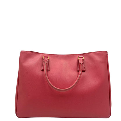 retro Borsa Prada in pelle saffiano rosa con hardware dorato, munita di doppi manici stondati, di lusso, originale, ottime condizioni, usata 