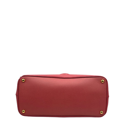 base Borsa Prada in pelle saffiano rosa con hardware dorato, munita di doppi manici stondati, di lusso, originale, ottime condizioni, usata 