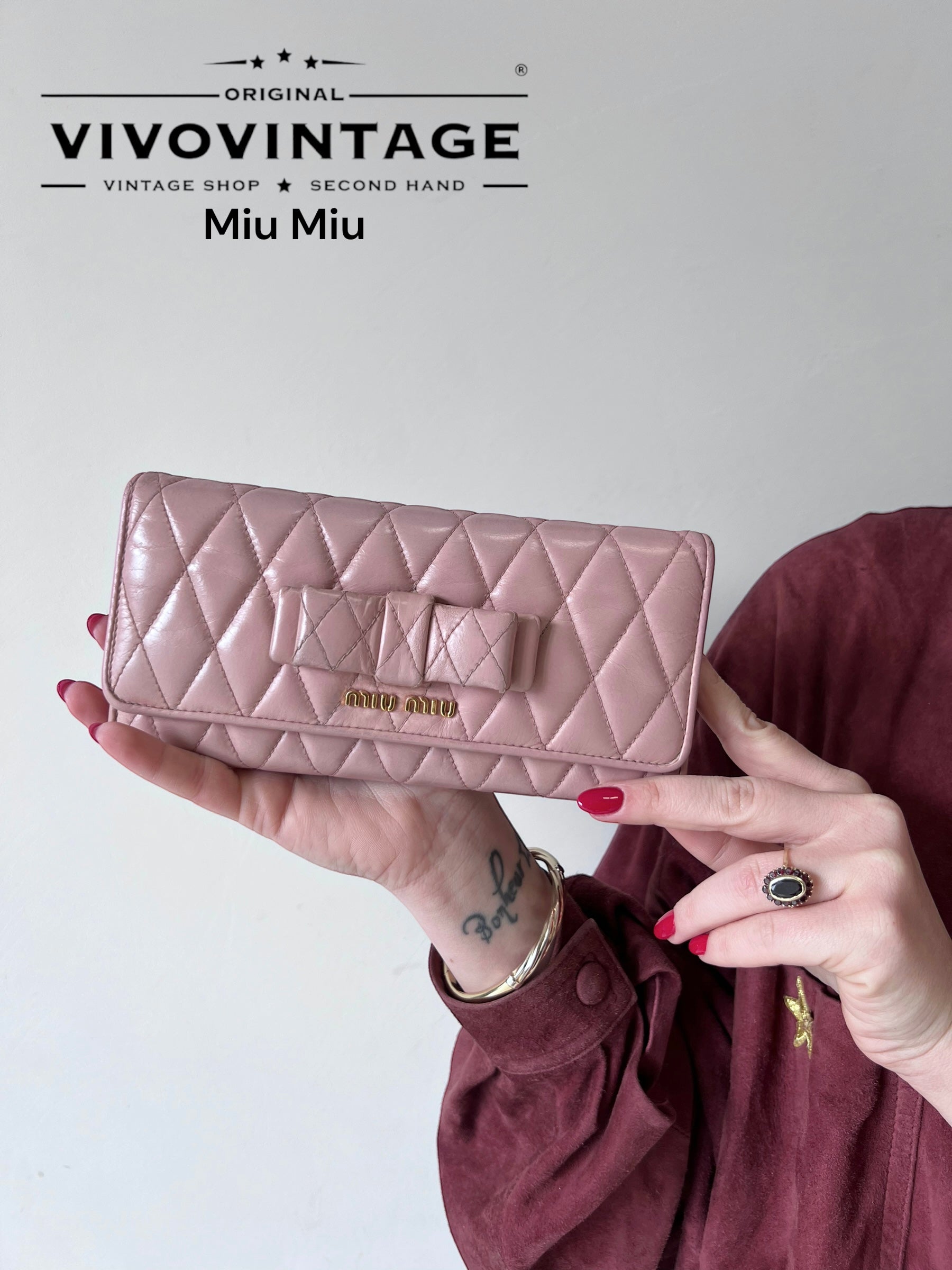 Portafoglio miu deals miu outlet