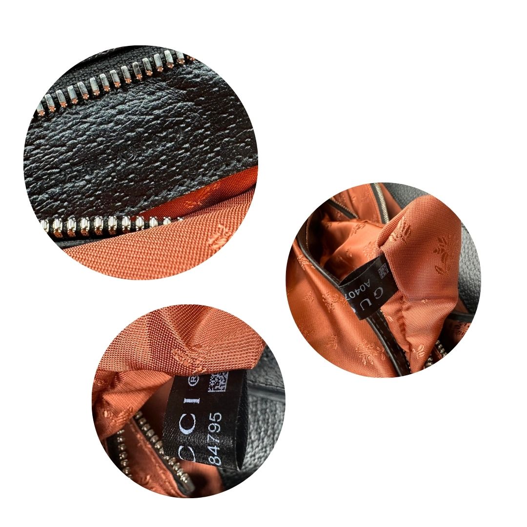 Sac Plat Gucci in tessuto Jacquard nero con trama GG incrociate arancione e finiture in pelle tono su tono. Parti metalliche argentate, e munita di doppi manici stondati e una tracolla regolabile, e amovibile.