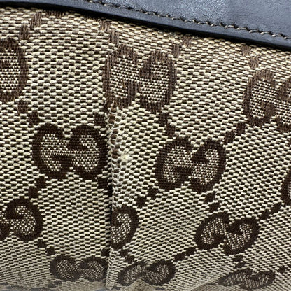 Borsa Gucci realizzata in tessuto beige con motivo GG di lusso, originale, ottime condizioni