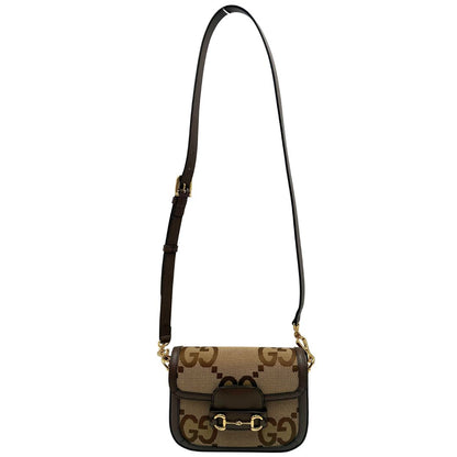 Borsa Gucci in tessuto beige con il monogramma in versione “Jumbo” e finiture in pelle marroni, munita di doppie tracolle, una in pelle amovibile e regolabile e una in tessuto Web verde e rosso amovibile e regolabile, di lusso, originale, eccellenti condizioni, usata