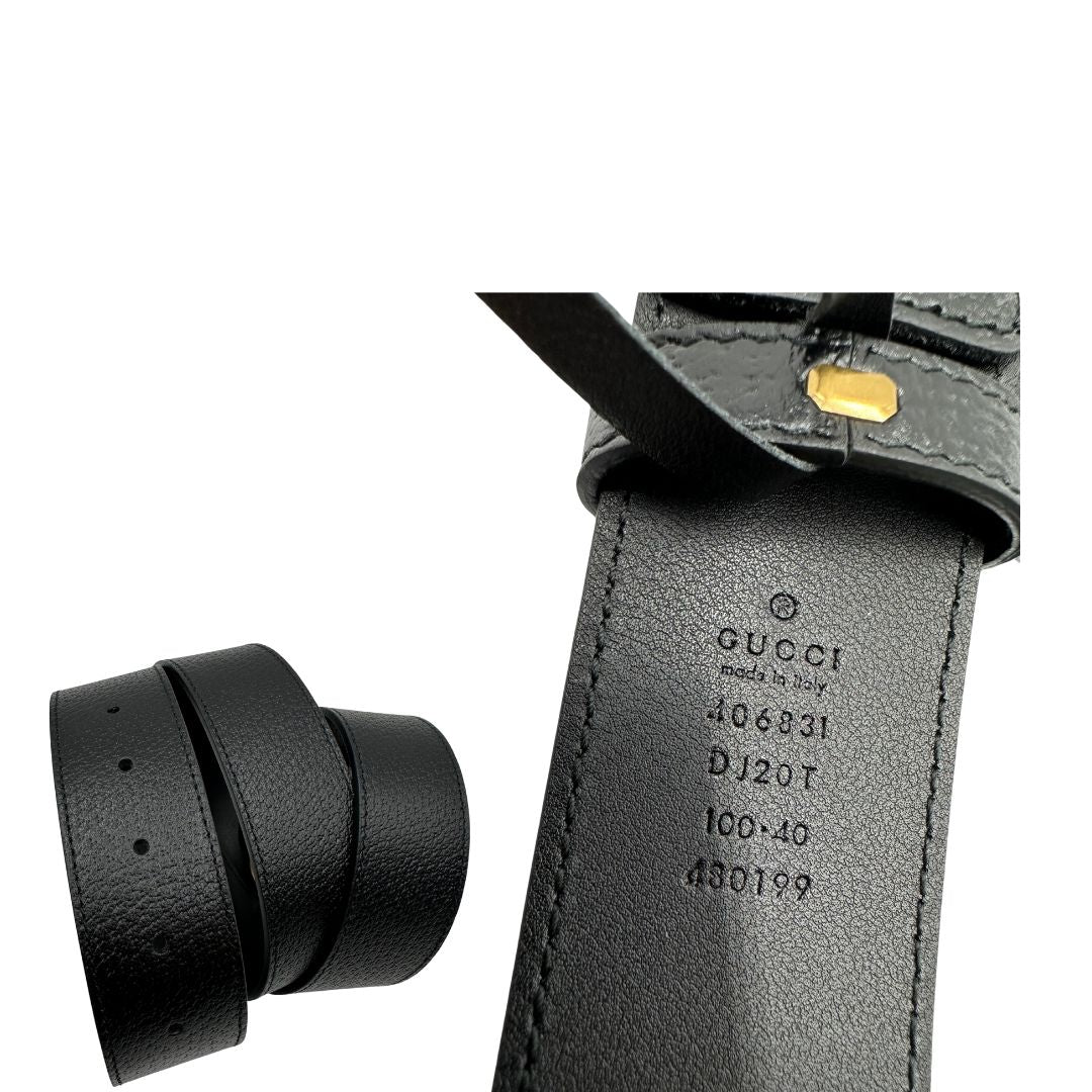 Cintura Gucci Marmont in pelle nera, impreziosita da fibbia GG in metallo dorato. Completa di dustbag e scatola logata, di lusso, originale, ottime condizioni, usata.