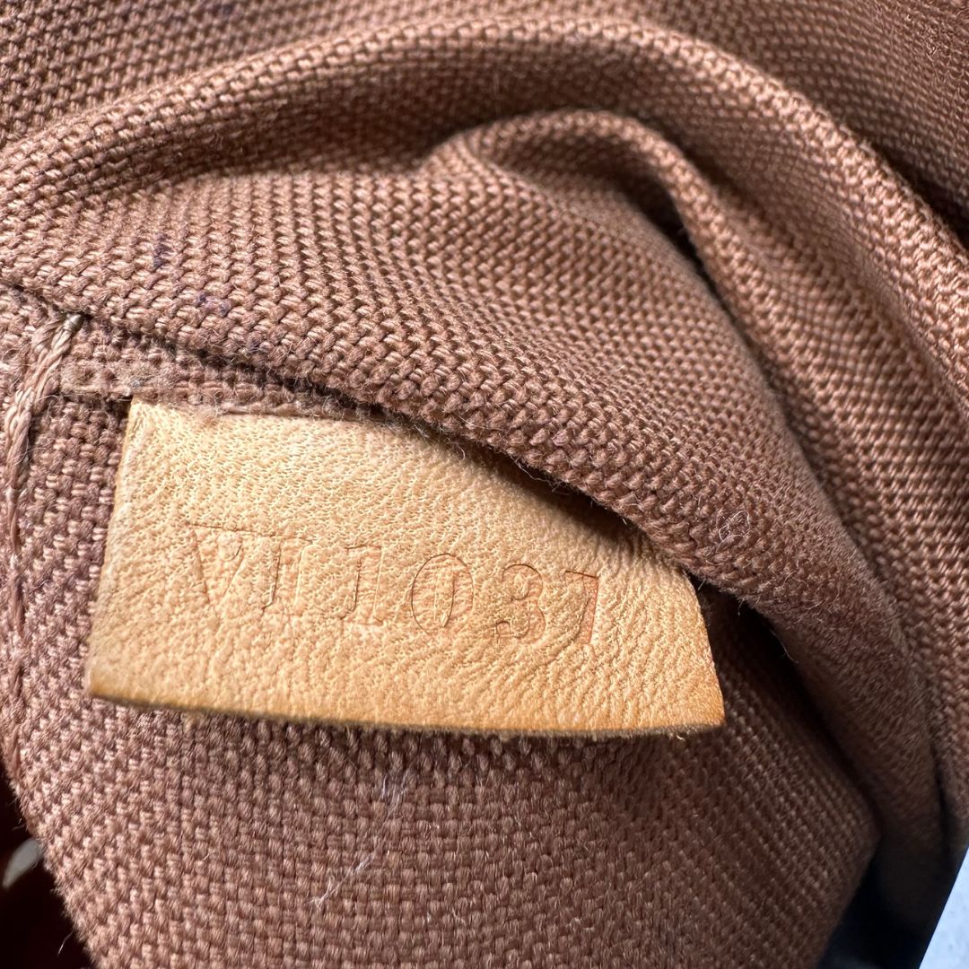 codice  Borsa LV in canvas marrone monogram con finiture in vacchetta naturale, di lusso, originale, buone condizioni. 