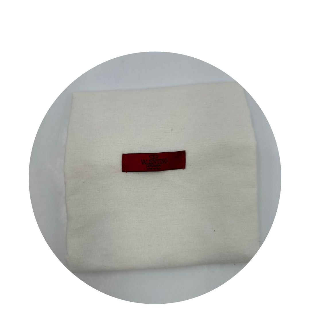 interno Borsa V. G. in pelle color rosa salmone impreziosita da borchie piramidali, di lusso, originale, ottime condizioni.