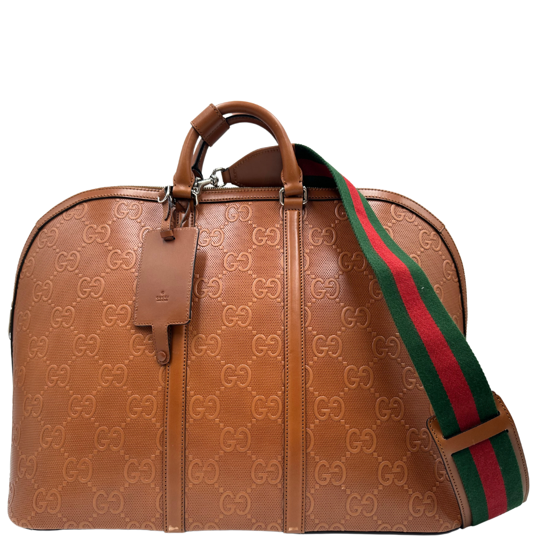 Gucci Duffle large embossed