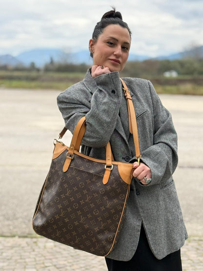 front Borsa Louis Vuitton Métis in canvas marrone monogram con dettagli in vacchetta naturale e parti metalliche dorate. Munita di doppi manici e una tracolla regolabile e amovibile, di lusso, originale, ottime condizioni, usata, originale. 