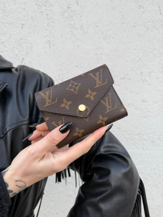 Louis Vuitton portafoglio Victorine in tela monogram, di lusso, originale, usato, ottime condizioni.