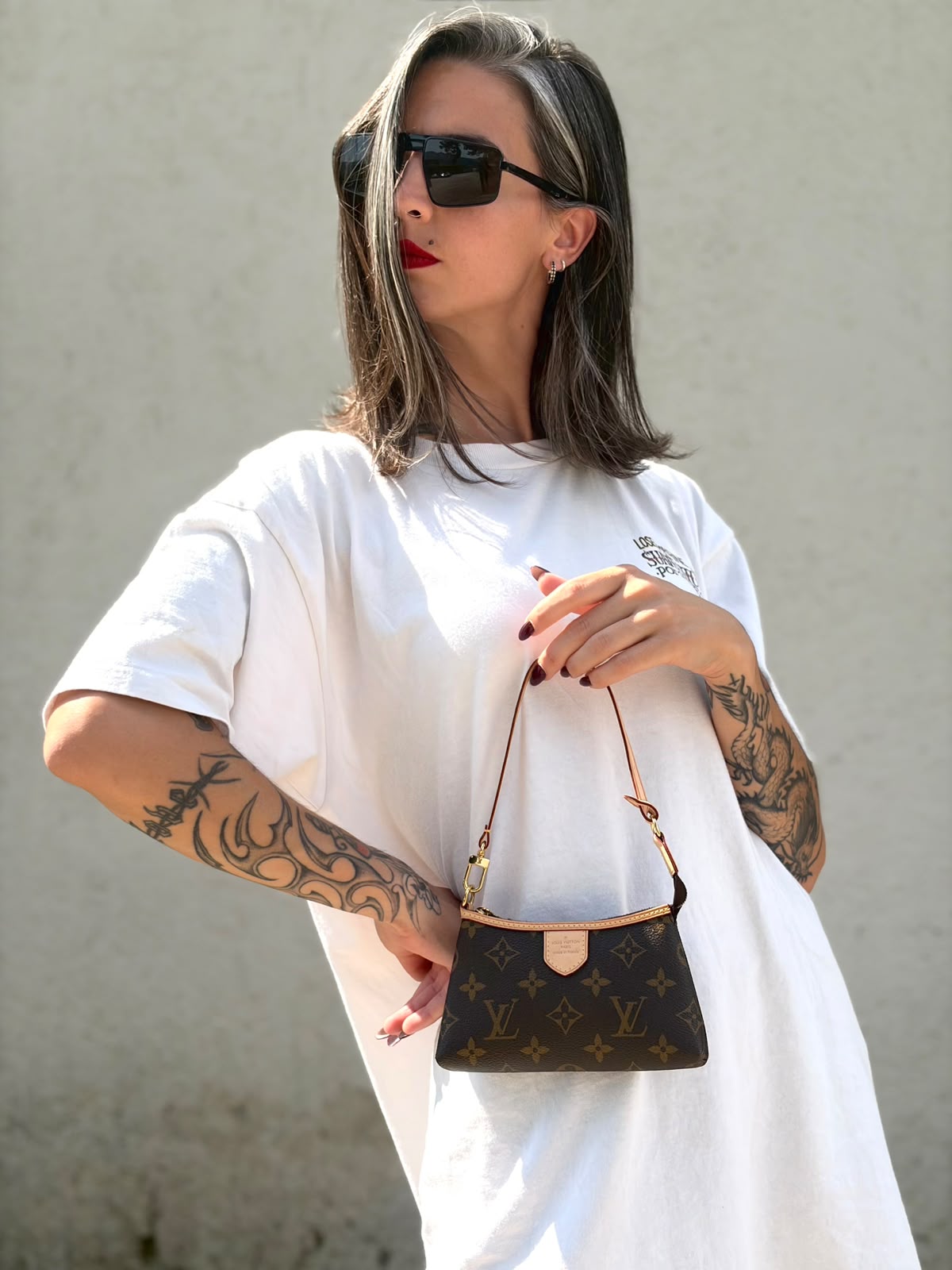 Pochette Delightful Louis Vuitton