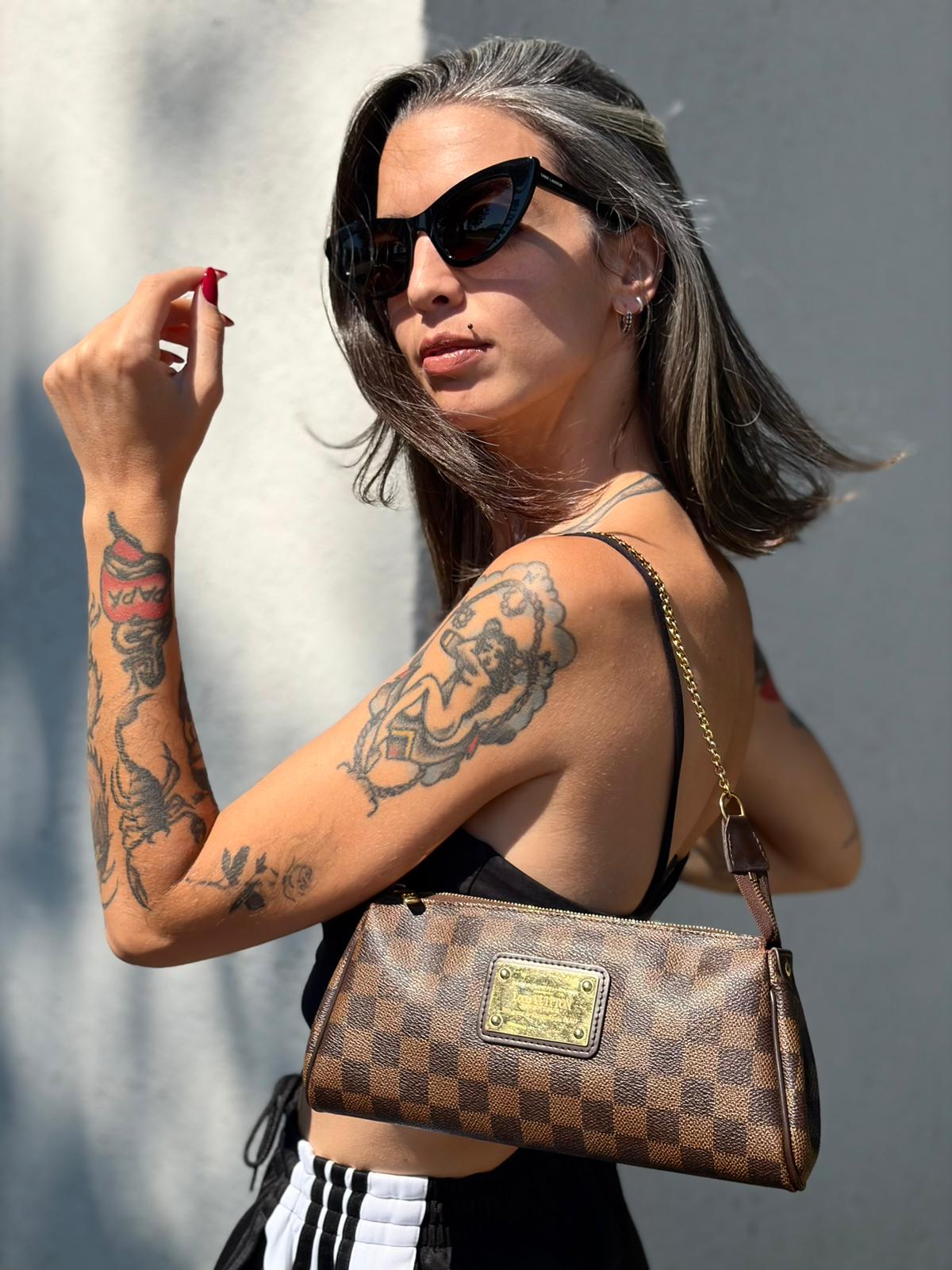 Pochette Eva Damier Ébène Louis Vuitton