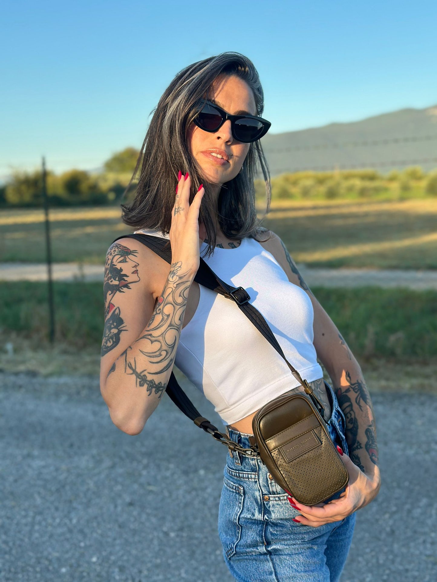 Tracolla traforata Bottega Veneta
