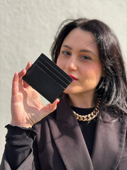 Indossata, Portafoglio Prada in pelle Saffiano nera. Originale, usato, di lusso, in ottime condizioni