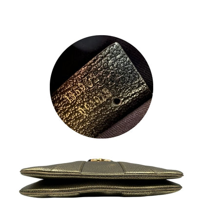 Borsa Gucci Ring x Tom Ford in pelle martellata color oro verdastro effetto metallizzato con parti metalliche dorate e dettagli bamboo in metallo. Da indossare a spalla. Originale, usato, in condizioni ottime. 