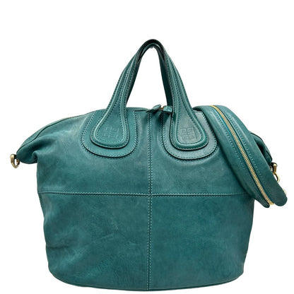 Borsa Nightingale Givenchy in pelle turchese munita di doppi manici e una tracolla amovibile impreziosita da una cerniera. parti metalliche dorate. Originale, usato, in condizioni ottime. 