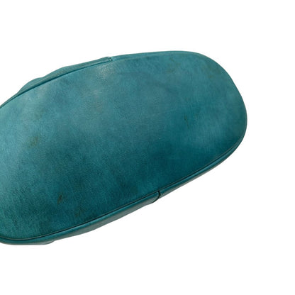 Borsa Nightingale Givenchy in pelle turchese munita di doppi manici e una tracolla amovibile impreziosita da una cerniera. parti metalliche dorate. Originale, usato, in condizioni ottime. 