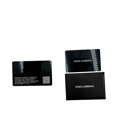 Marsupio D&G in nylon nero rifinito con parti metalliche effetto renio; munita di cinta regolabile con chiusura a gancio 