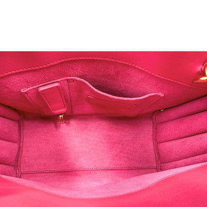 Sac De Jour nano Saint Laurent in pelle rosa babrie con doppi manici stondati e tracolla regolabile, e amovibile. Parti metalliche dorate. Originale, usato, condizioni ottime. 