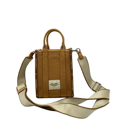 Retro The Tote Bag Marc Jacobs in tessuto Jacquard con tracolla regolabile e amovibile in tessuto Bianco, rifinita con parti metalliche argentate.