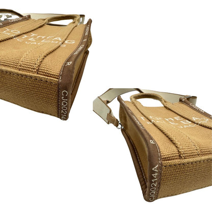 Angoli The Tote Bag Marc Jacobs in tessuto Jacquard con tracolla regolabile e amovibile in tessuto Bianco, rifinita con parti metalliche argentate.