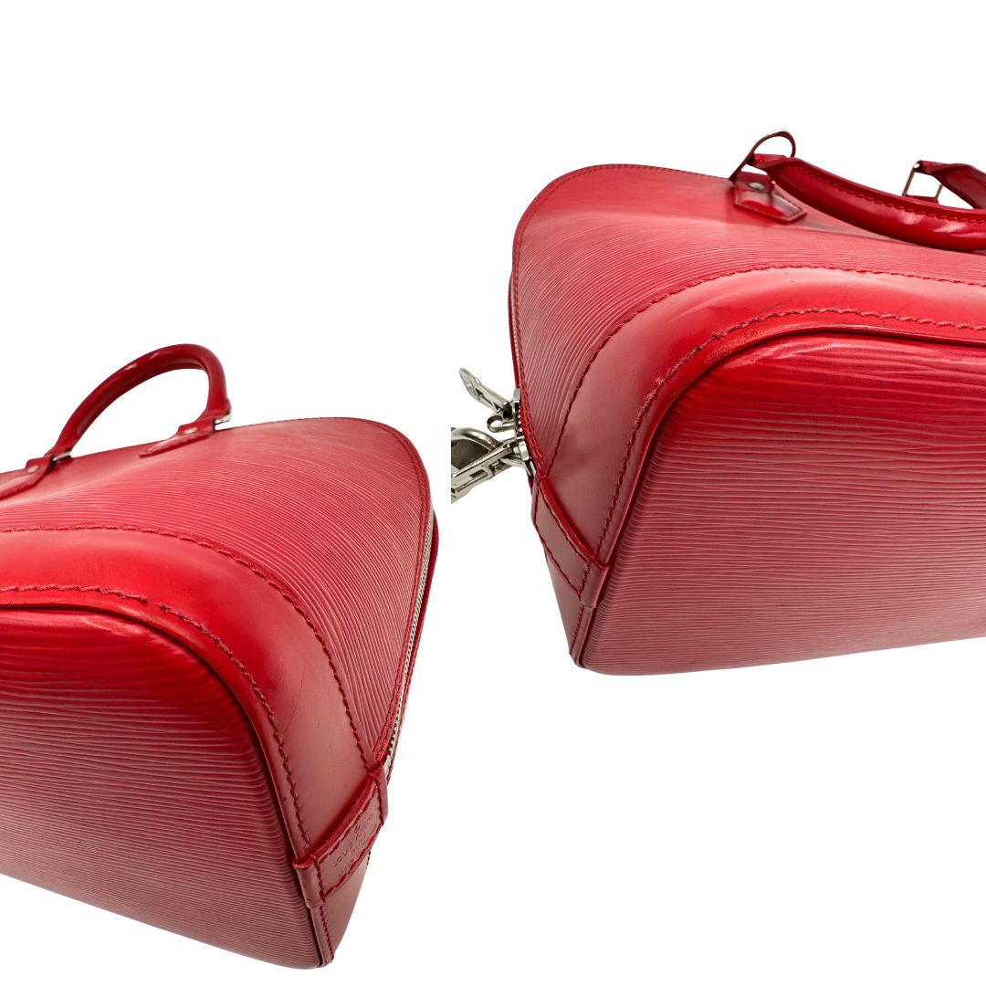 Angoli Borsa Alma PM Louis Vuitton in pelle Epi rossa con parti metalliche argentate, munita di due manici stondati