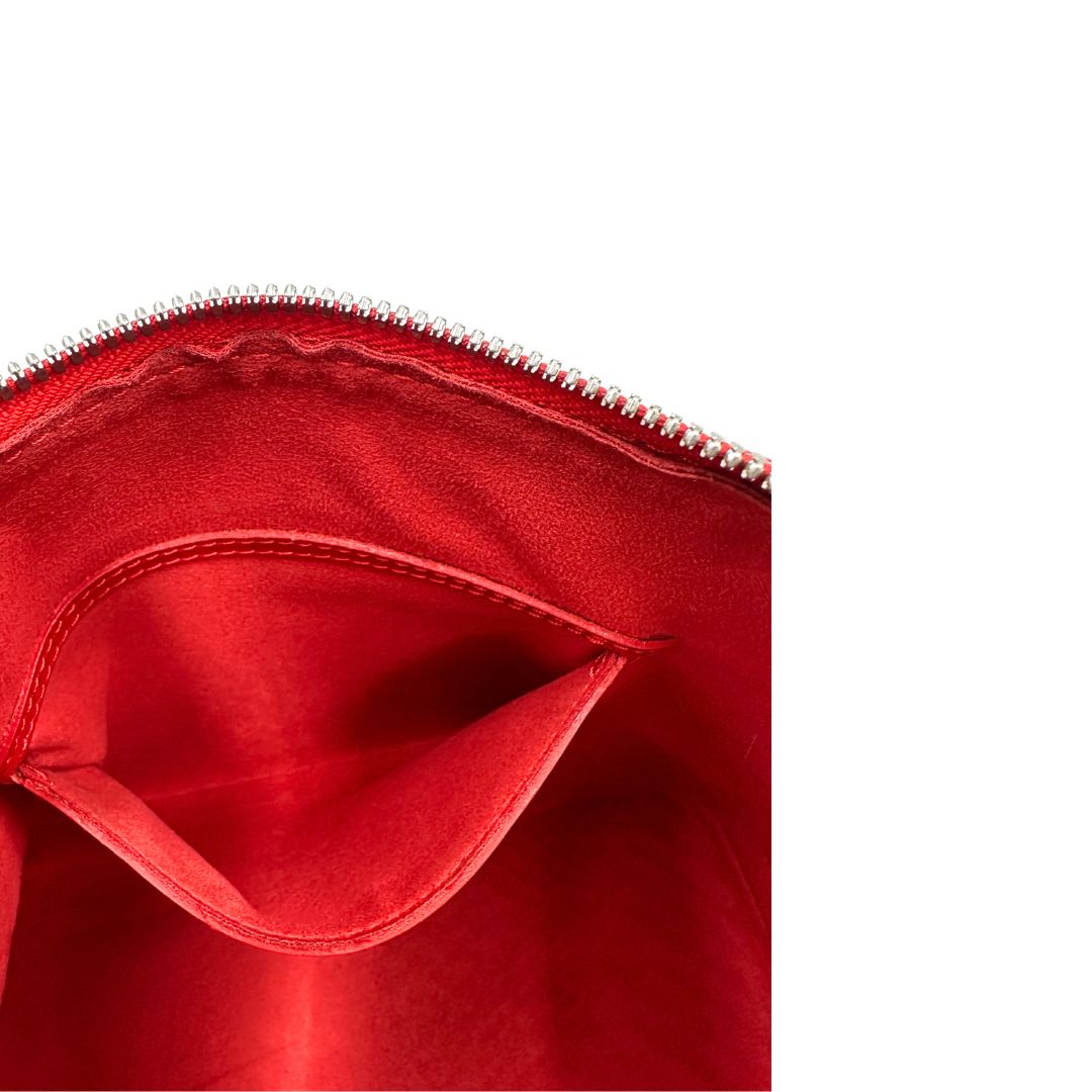 Tasca Borsa Alma PM Louis Vuitton in pelle Epi rossa con parti metalliche argentate munita di due manici stondati