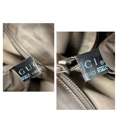 Borsa Gucci in canvas grigio laminato GG con finiture in pelle Tono su tono e parti metalliche argentate. Dotata di Doppi manici e tracolla in tessuto regolabile.