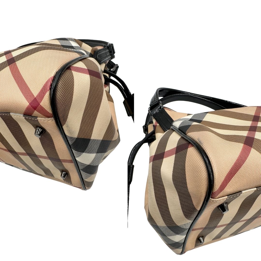 angoli Borsa Burberry in canvas trama tartan con finiture in pelle nera verniciata; munita di doppi manici, indossabile a spalla. Completa di dustbag, di lusso, originale, ottimo stato 