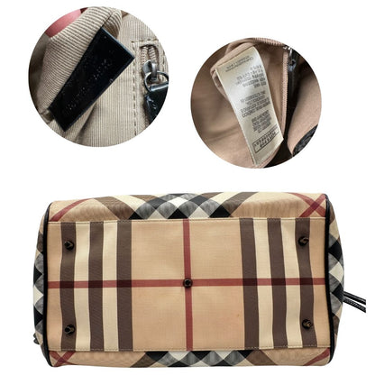 base Borsa Burberry in canvas trama tartan con finiture in pelle nera verniciata; munita di doppi manici, indossabile a spalla. Completa di dustbag, di lusso, originale, ottimo stato 
