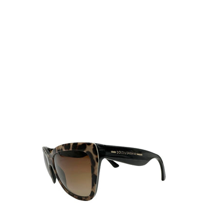 lato Occhiali da sole Dolce e Gabbana in acetato trama animalier e finiture nere. Completi di sacchetto antipolvere, di lusso, originale, ottime condizoni. 