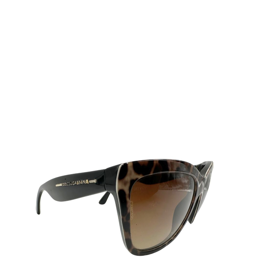 lato Occhiali da sole Dolce e Gabbana in acetato trama animalier e finiture nere. Completi di sacchetto antipolvere, di lusso, originale, ottime condizoni. 