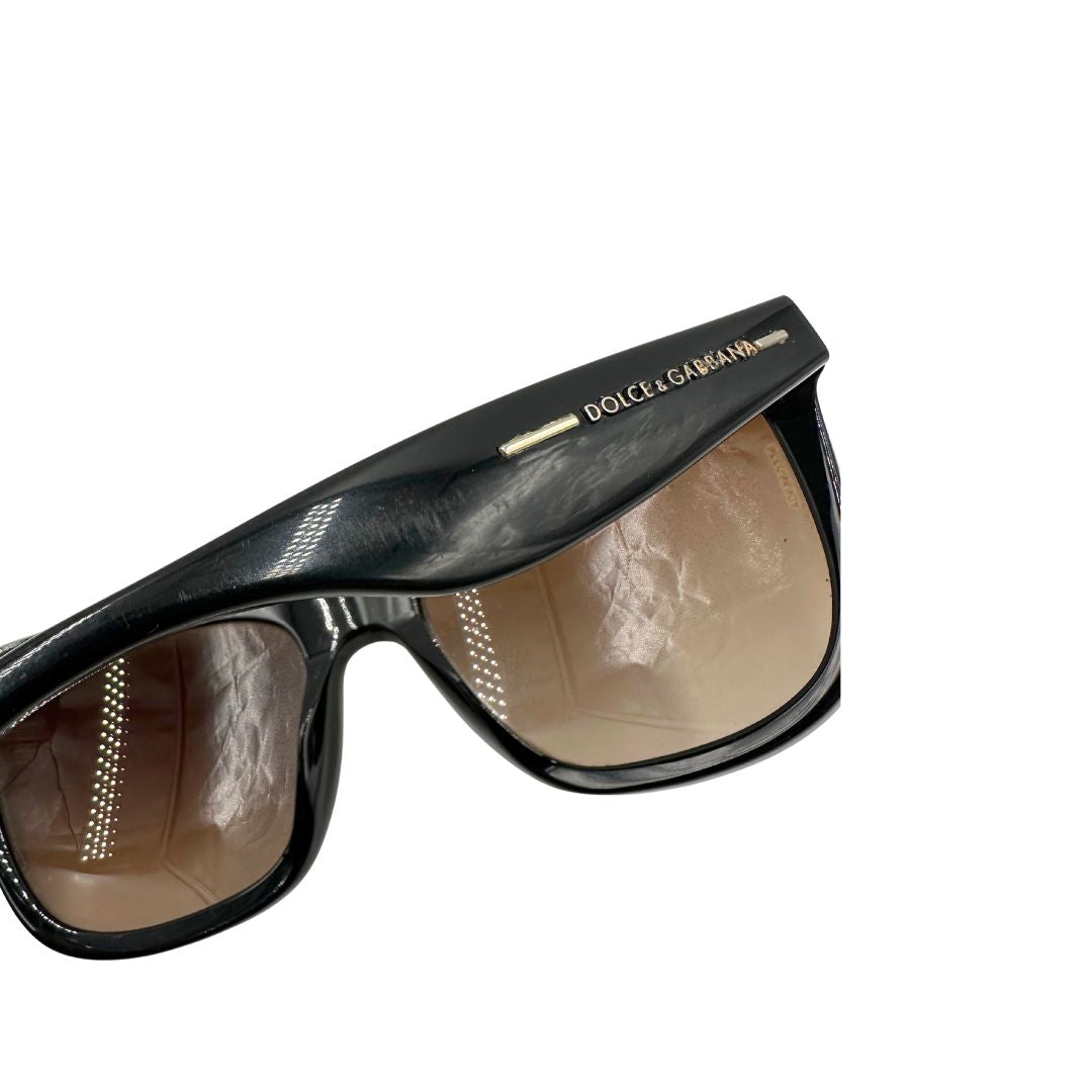 Occhiali da sole Dolce e Gabbana in acetato trama animalier e finiture nere. Completi di sacchetto antipolvere, di lusso, originale, ottime condizoni.