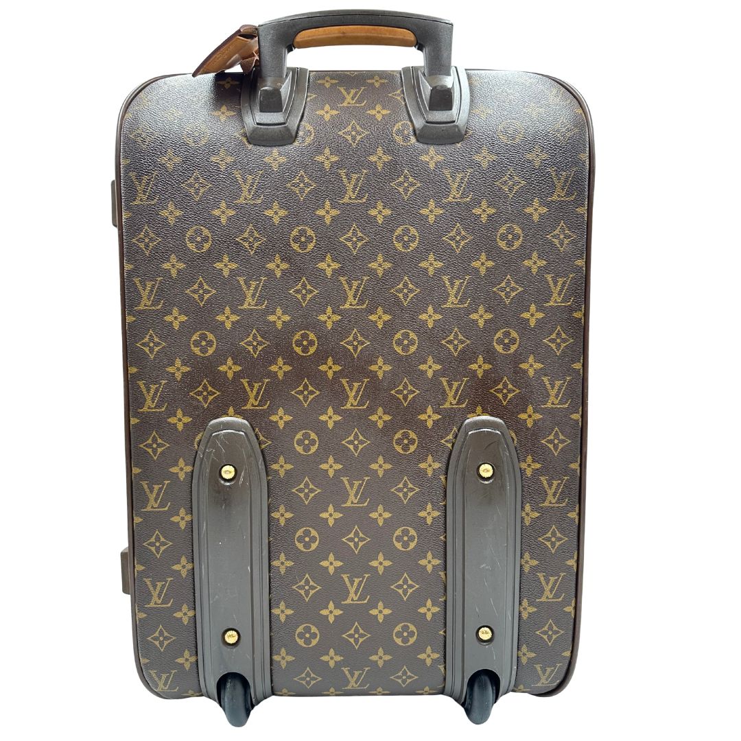 Retro Valigia Louis Vuitton in canvas marrone monogram con dettagli in vacchetta naturale e parti metalliche dorate