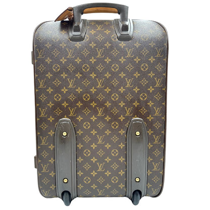 Retro Valigia Louis Vuitton in canvas marrone monogram con dettagli in vacchetta naturale e parti metalliche dorate