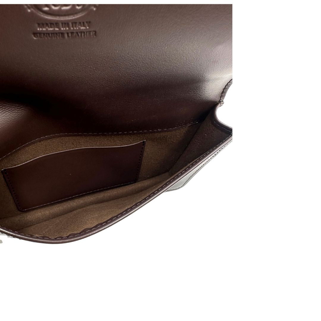 interno Borsa Tod's in pelle color testa di moro con parti metalliche dorate; munita di una tracolla in catena con spallaccio in pelle. Completa di dustbag, di lusso, originale, ottime condizioni. 