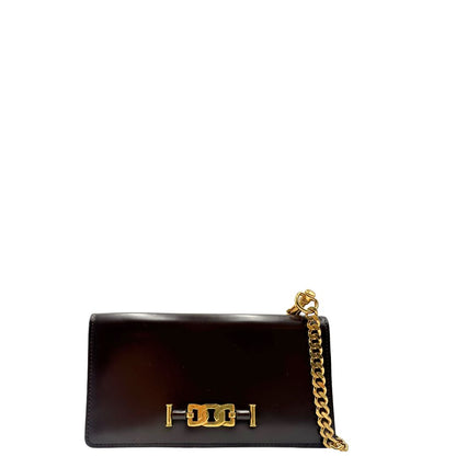 front Borsa Tod's in pelle color testa di moro con parti metalliche dorate; munita di una tracolla in catena con spallaccio in pelle. Completa di dustbag, di lusso, originale, ottime condizioni.