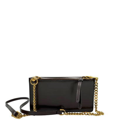 retro Borsa Tod's in pelle color testa di moro con parti metalliche dorate; munita di una tracolla in catena con spallaccio in pelle. Completa di dustbag, di lusso, originale, ottime condizioni. 