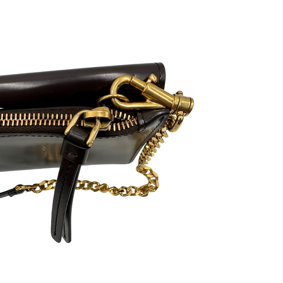 tracolla amovibile Borsa Tod's in pelle color testa di moro con parti metalliche dorate; munita di una tracolla in catena con spallaccio in pelle. Completa di dustbag, di lusso, originale, ottime condizioni. 