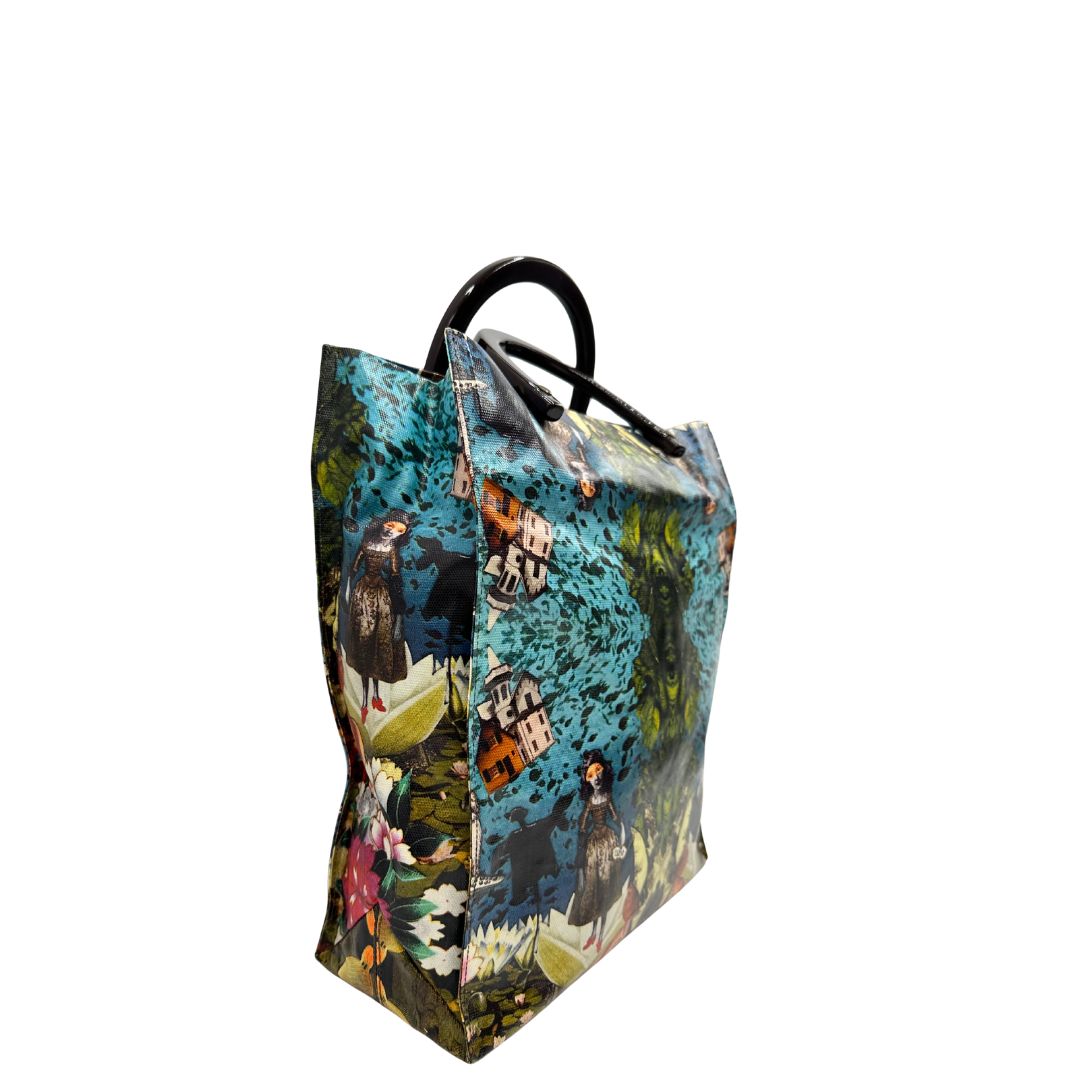 Laterali Borsa Furla in fibra sintetica multicolore stampata con fantasia artistica surreale e manici rigidi marroni in acetato con inserti metalliche dorate. Completa di dustbag. Originale, usata, di lusso, in ottime condizioni