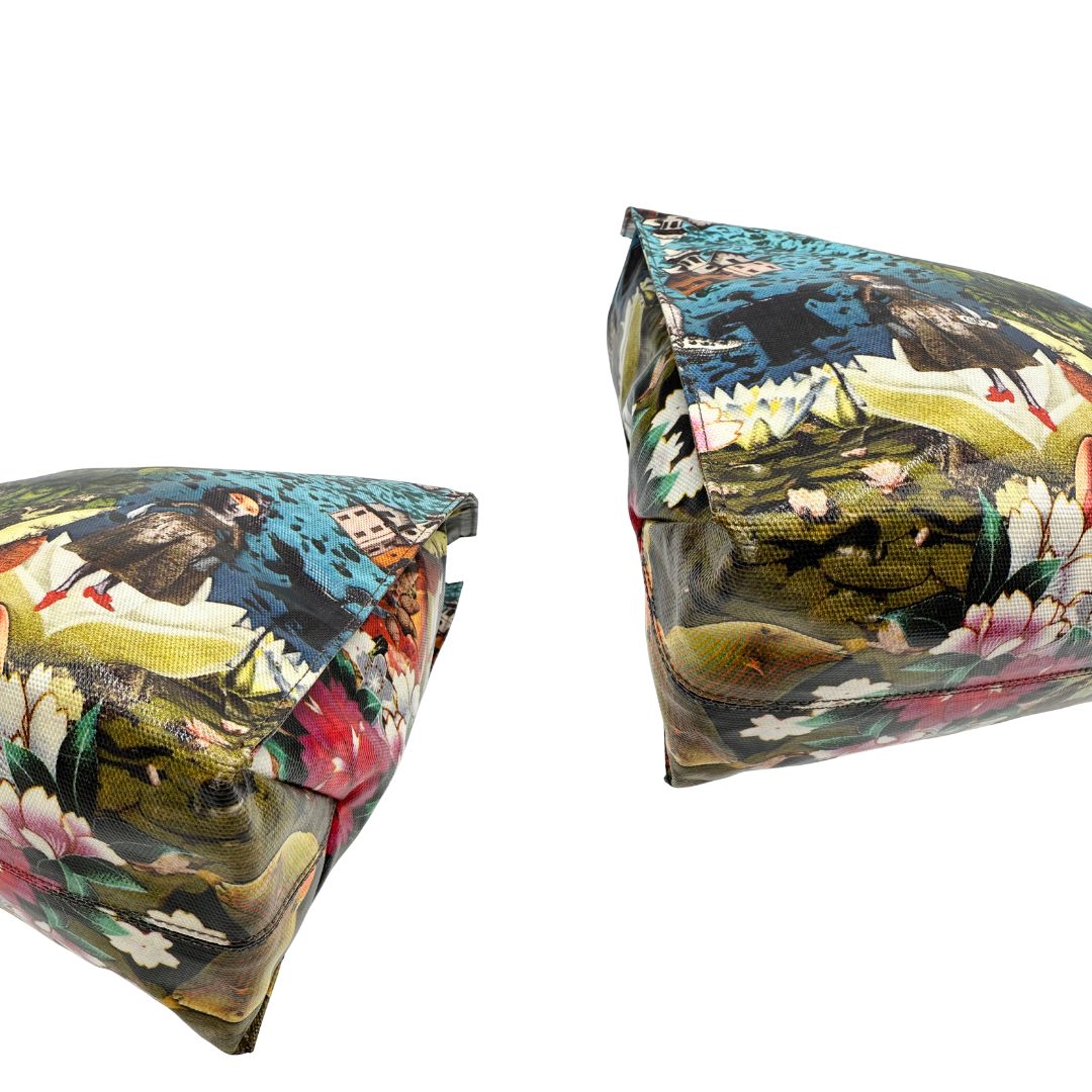 Angoli Borsa Furla in fibra sintetica multicolore stampata con fantasia artistica surreale e manici rigidi marroni in acetato con inserti metalliche dorate. Completa di dustbag. Originale, usata, di lusso, in ottime condizioni