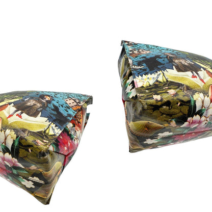 Angoli Borsa Furla in fibra sintetica multicolore stampata con fantasia artistica surreale e manici rigidi marroni in acetato con inserti metalliche dorate. Completa di dustbag. Originale, usata, di lusso, in ottime condizioni