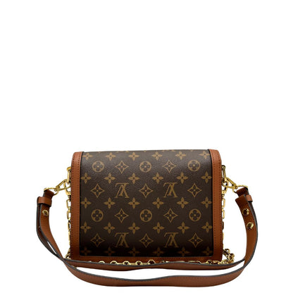 Retro Borsa Dauphine MM Louis Vuitton in tela monogram, e monogram reverse bicolore con finiture in pelle cognac e parti metalliche dorate. Munita di una tracolla in pelle e un manico in catena, amovibili. Originale, usato, di lusso, in ottime condizioni 