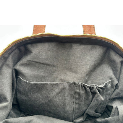 interno Borsa Givenchy Nightingale in pelle marrone e parti metalliche dorate. Munita di doppi manici e tracolla una amovibile arricchita da una cerniera decorativa, di lusso, originale. 