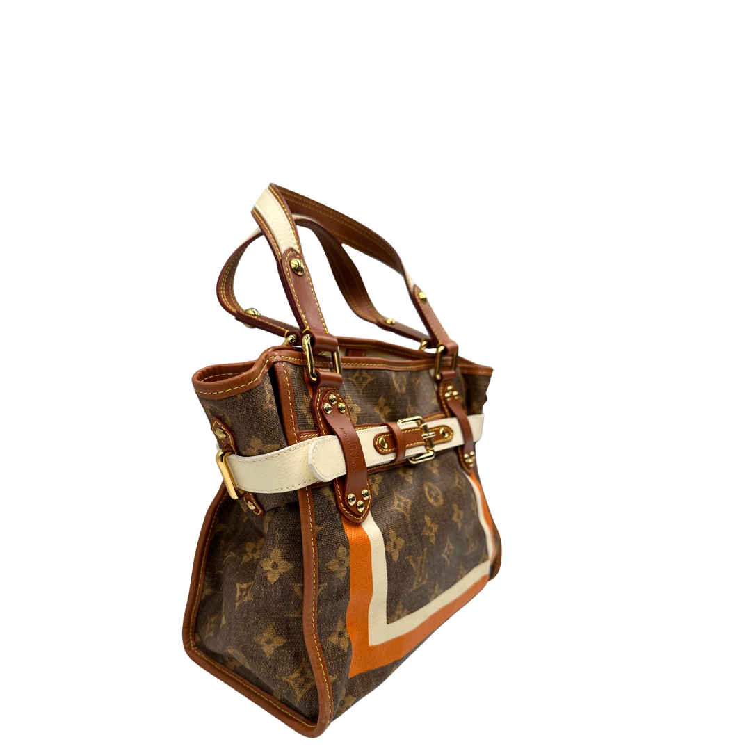 Laterali Borsa Louis Vuitton Tisse Rayures in tela monogram arricchita da finiture in pelle color cognac e crema con dettagli metalliche dorate; munita di due manici in pelle. Completa di scatola e dustbag. Originale, usata, di lusso, in ottime condizioni